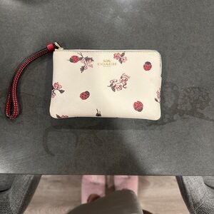 Coach Cream Wristlet with Red Accents